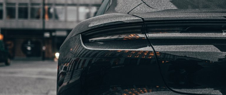 black car parked beside black